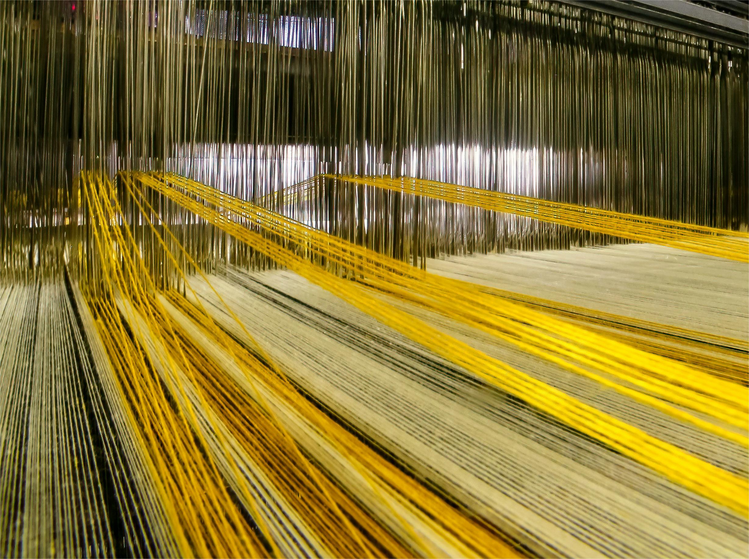 The Evolution of Weaving Machines: Transforming Textile Production