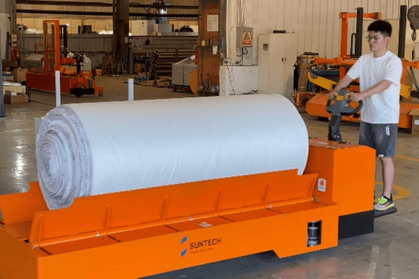 How Much Can an Electric Warp Beam Trolley Save for Textile Mills?