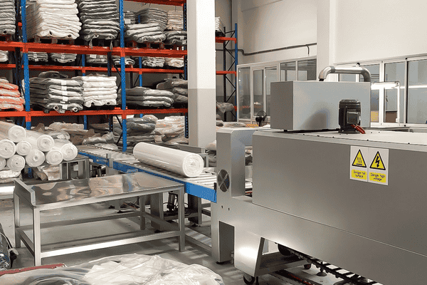 Can the Packing Machines Handle Different Types of Fabrics and Production Requirements?